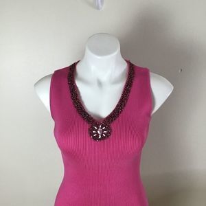 Bellini fuchsia sleeveless sweater with  brown and white beads. Size large